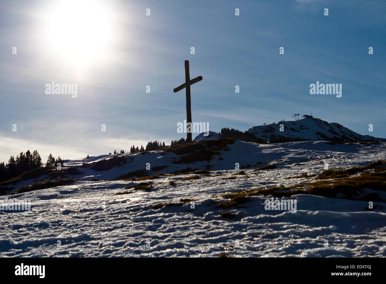 wooden cross on a mountainside in Flumserberg Tannenboden ski resort switzerland Stock Photo