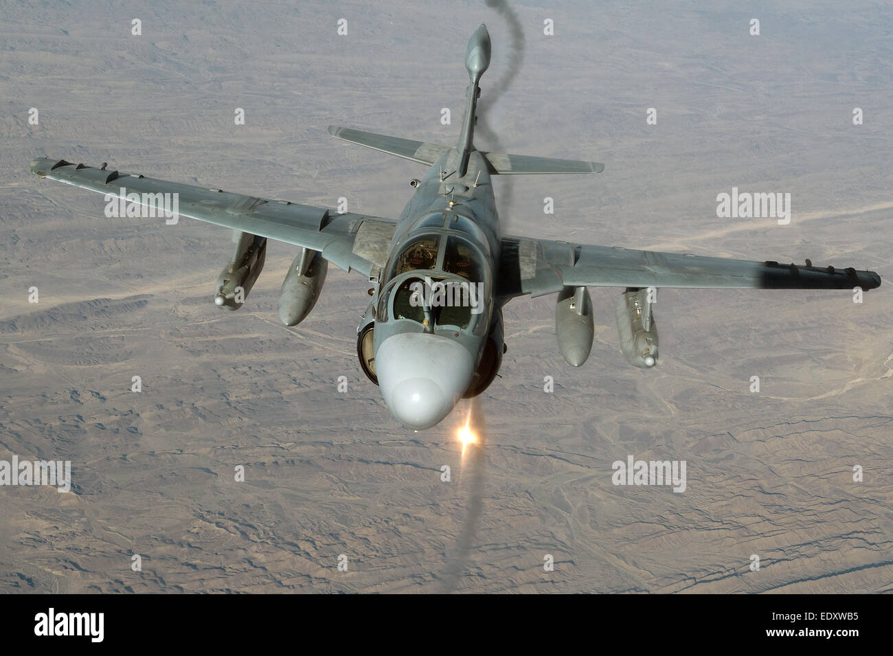 A US Marine Corps Prowler electronic attack aircraft fires flares during a mission over Afghanistan December 30, 2014. Stock Photo