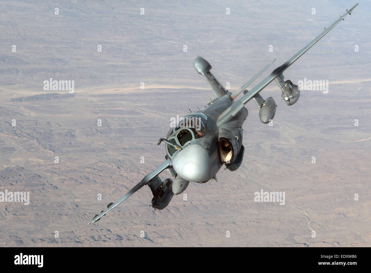 A US Marine Corps Prowler electronic attack aircraft banks sharply during a mission over Afghanistan December 30, 2014. Stock Photo
