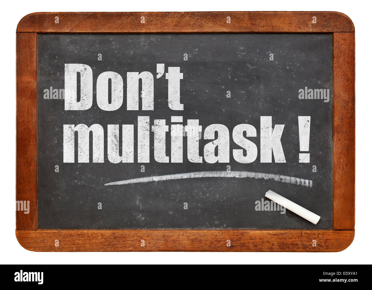 Do not multitask!  - white chalk text  on a vintage slate blackboard Stock Photo