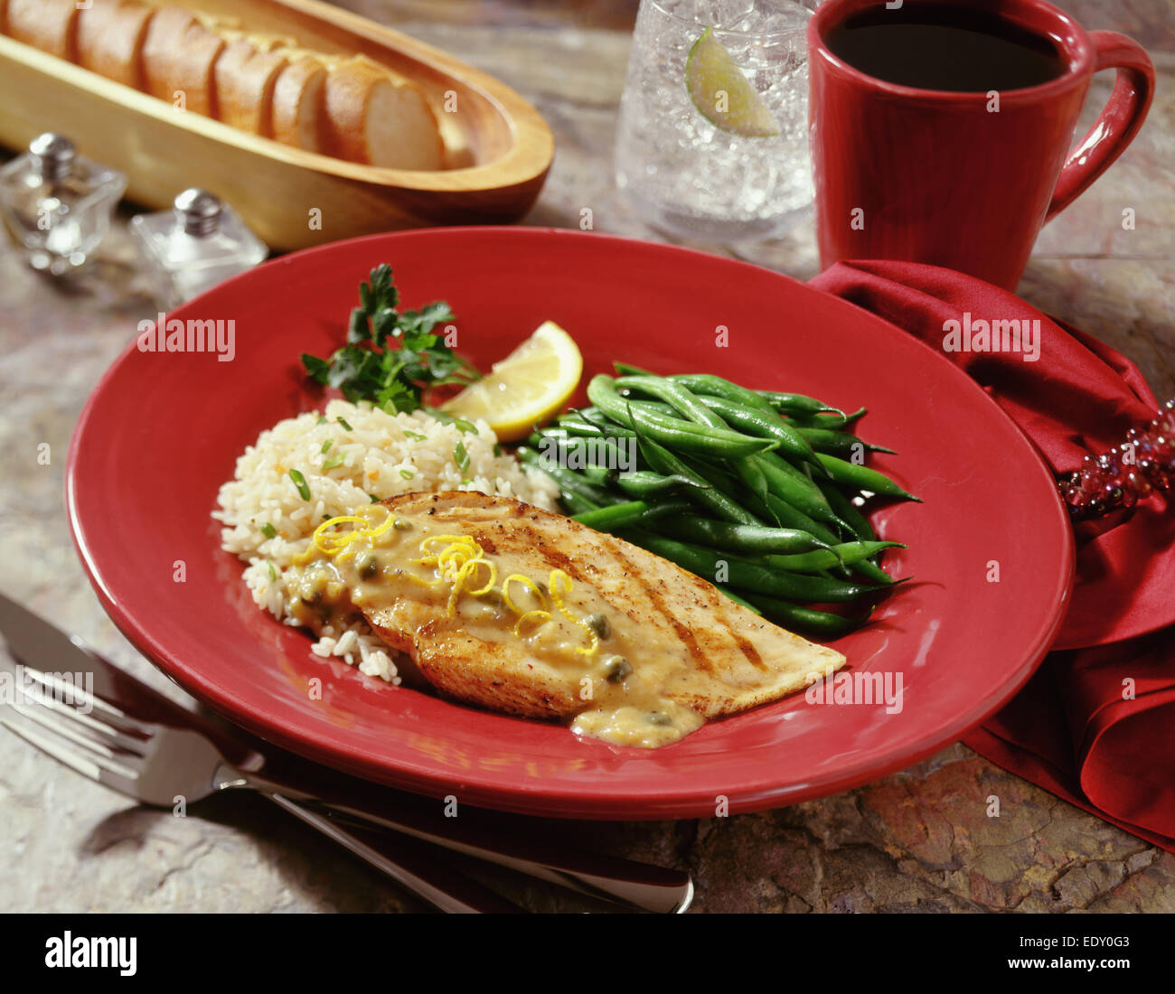 Chicken in caper sauce with rice Stock Photo Alamy