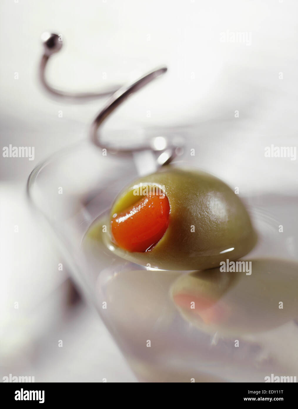 Olive in Martini Glass Stock Photo Alamy