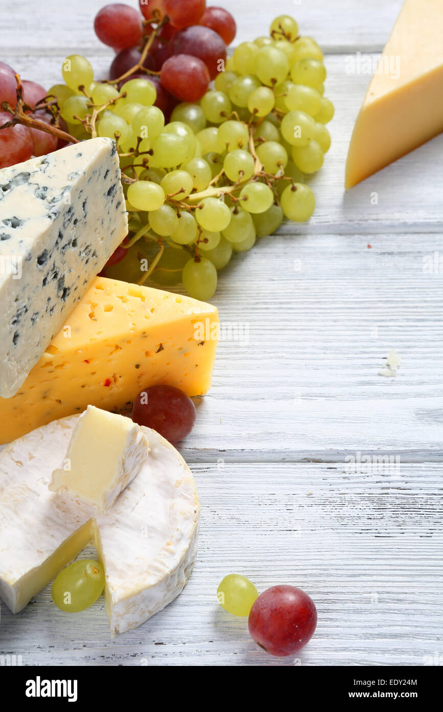 Gourmet cheeses with grapes, food Stock Photo Alamy