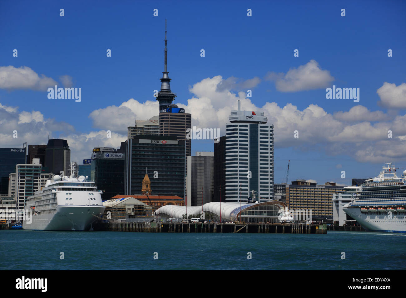 Auckland Port and skyline, Diamond Princess cruise ship and other shipping from Devenport Ferry, New Zealand Stock Photo