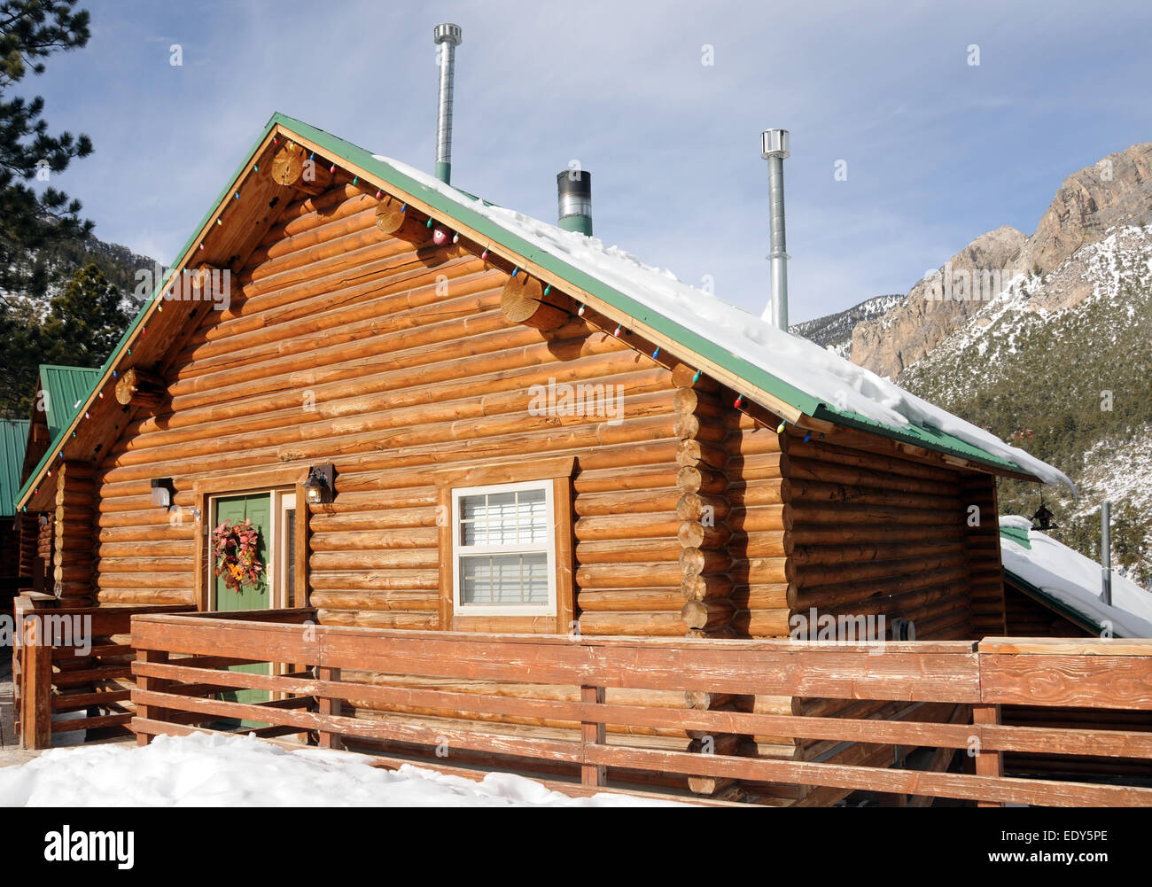 Mountain lodge in resort village surrounded by snow Nevada USA Stock Photo