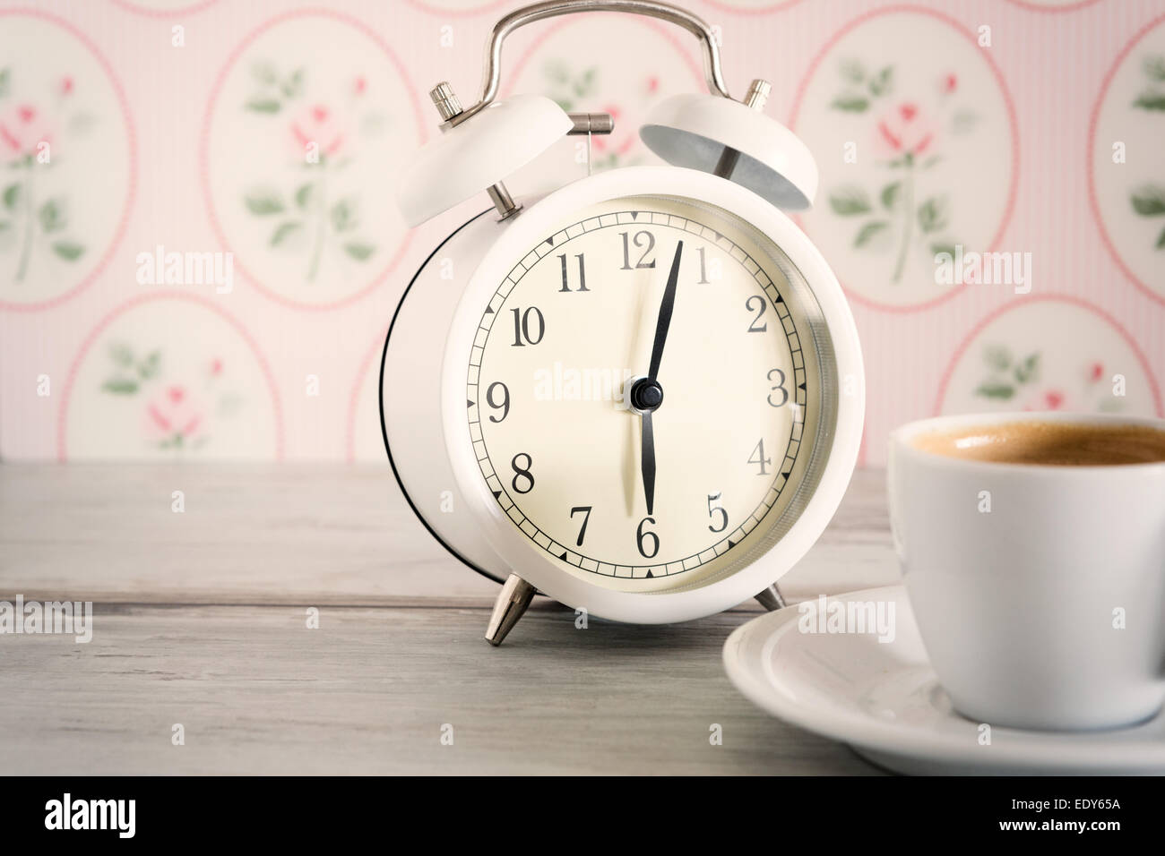 Vintage alarm clock with cup of coffee Stock Photo Alamy