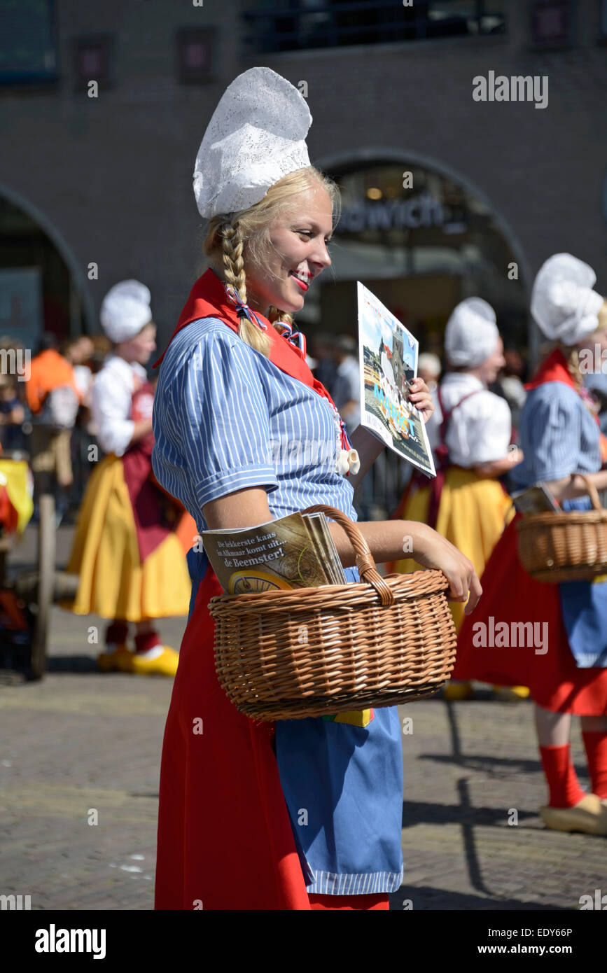 Girl in traditional Dutch costume at the cheese market, Waagplein
