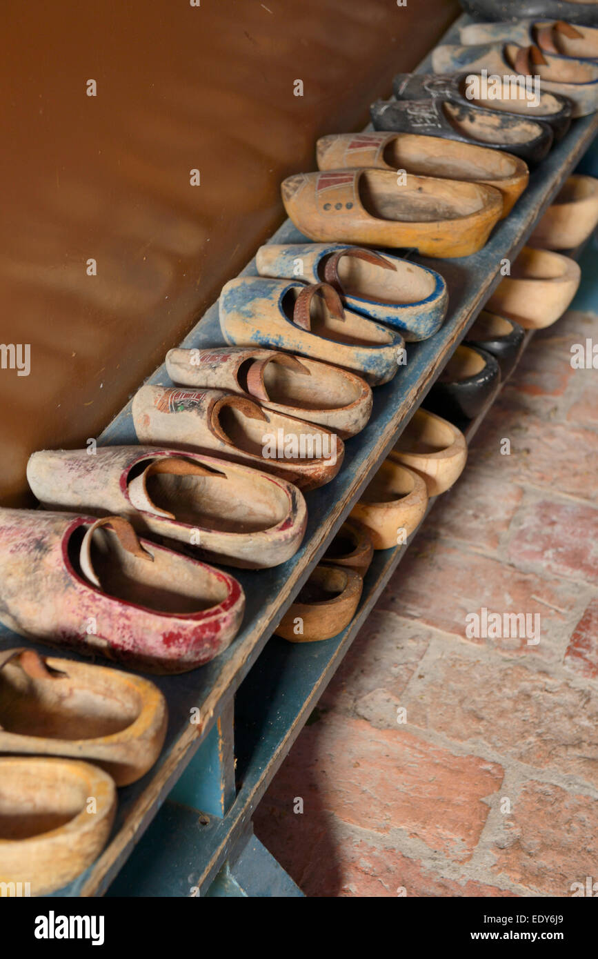 Wooden clogs on a bench in a schoolroom, Zuiderzee open air museum, Lake Ijssel, Enkhuizen, North Holland, Netherlands, Europe Stock Photo