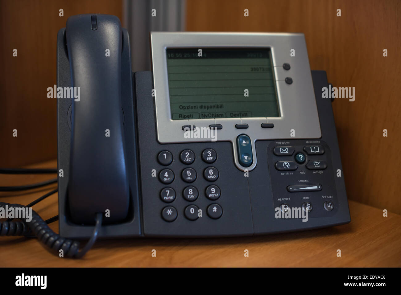 a phone in the office with dial buttons Stock Photo