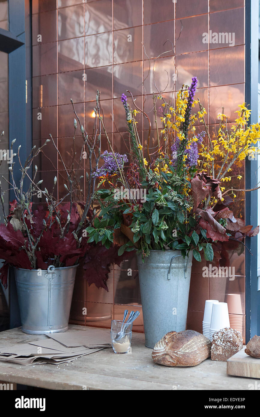 scenery sidewalk cafe. Bouquets of flowers and bread Stock Photo Alamy