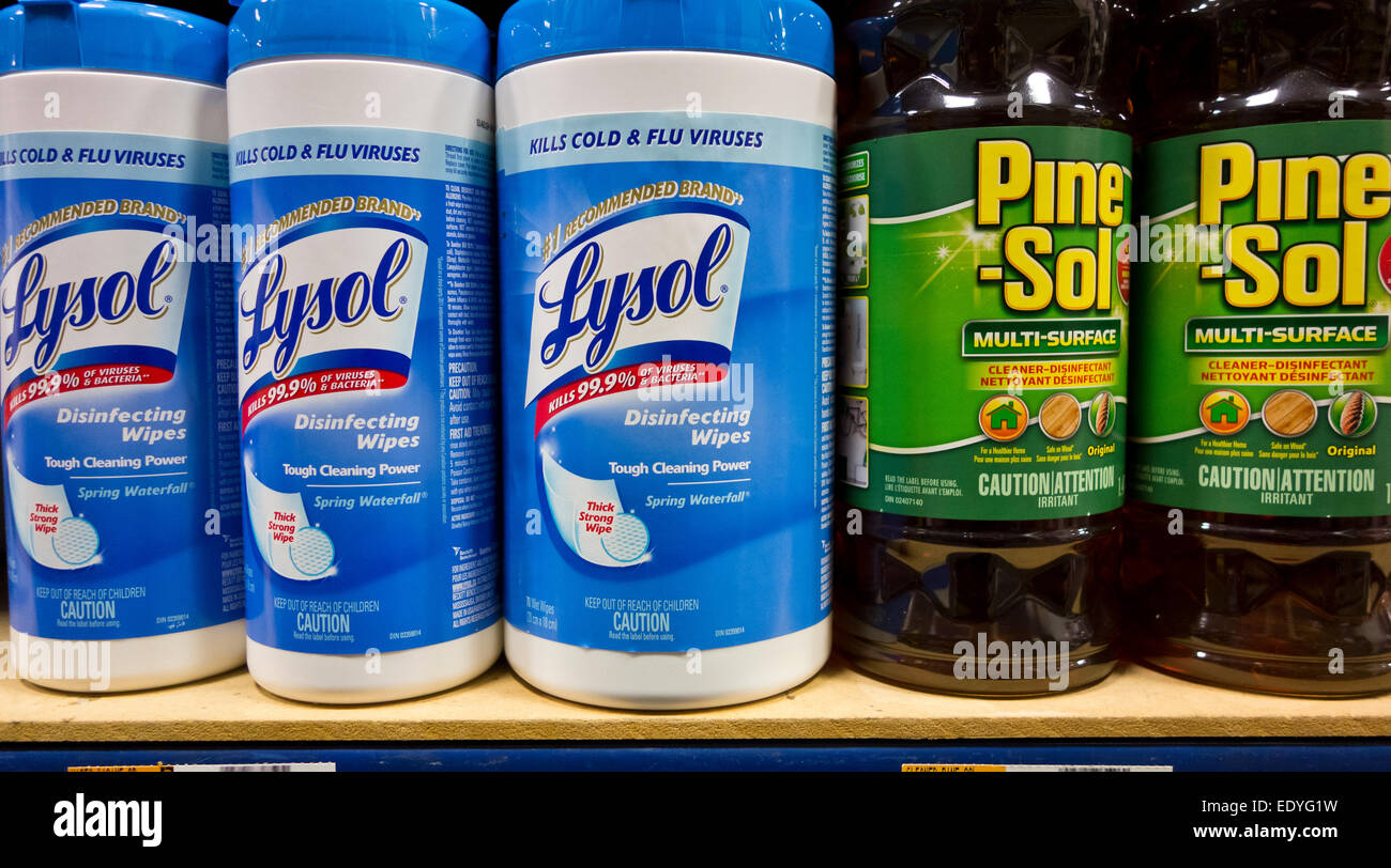 Household cleaning products used for disinfecting on a store shelf. Lysol disinfecting wipes and Pine-Sol. Stock Photo