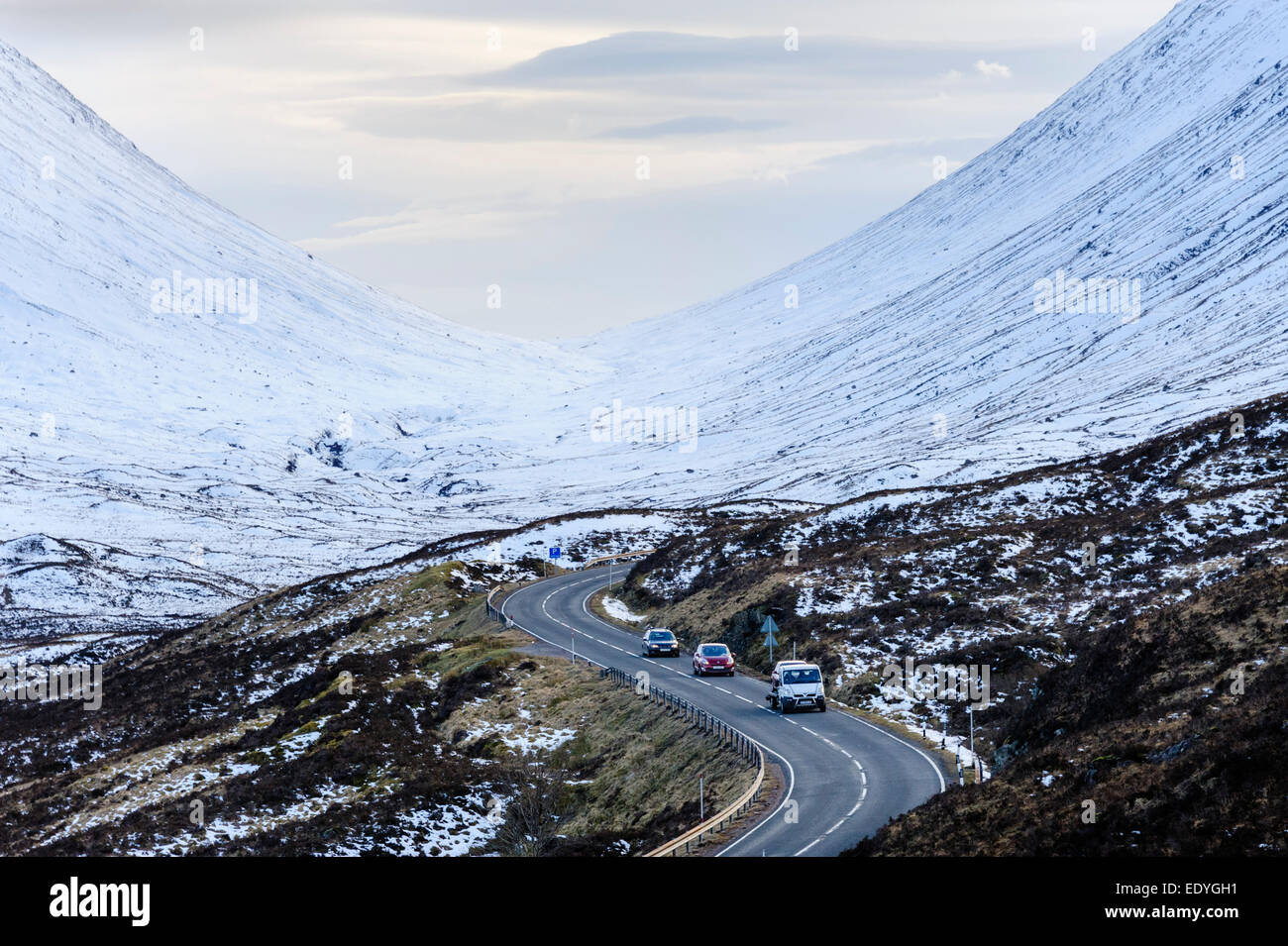Traffic on the A82 road as it curves through Glen Coe Stock Photo