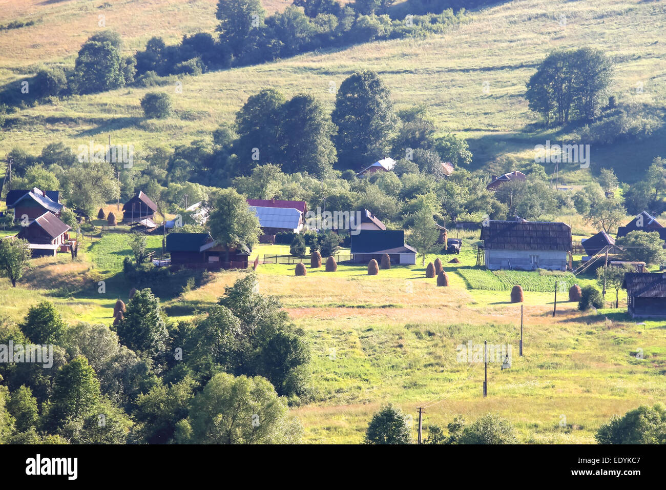 Ukrainian village in a valley of the Carpathian Mountains Stock Photo ...