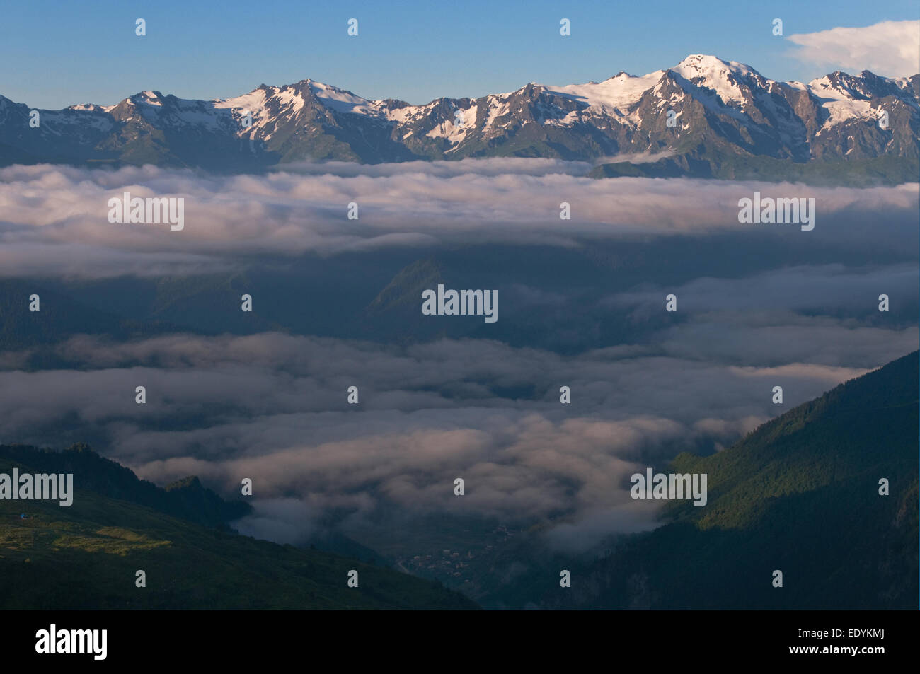 This is a landscape with mountains and clouds Stock Photo - Alamy