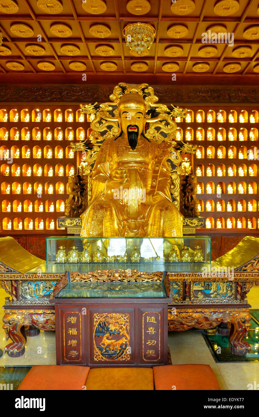 God of Wealth sculpture in the Giant Wild Goose Pagoda, Xi'an, Shaanxi Province, China Stock Photo