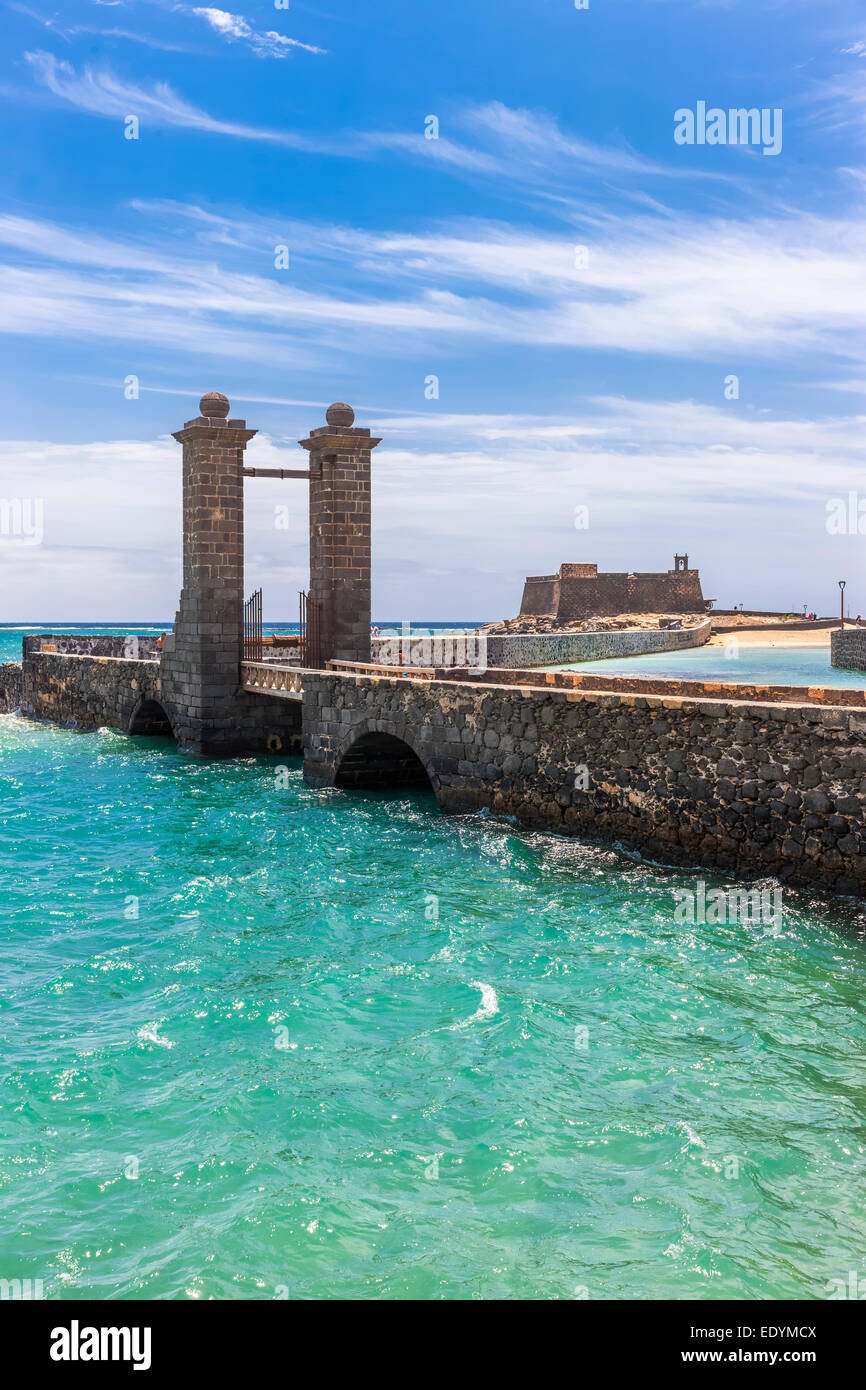 Bridge Puente de las Bolas, stone gate in front of the fort Castillo de