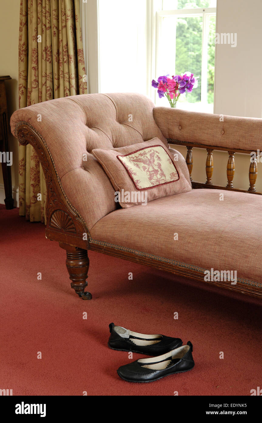 Chaise Loungue with shoes, England UK Stock Photo