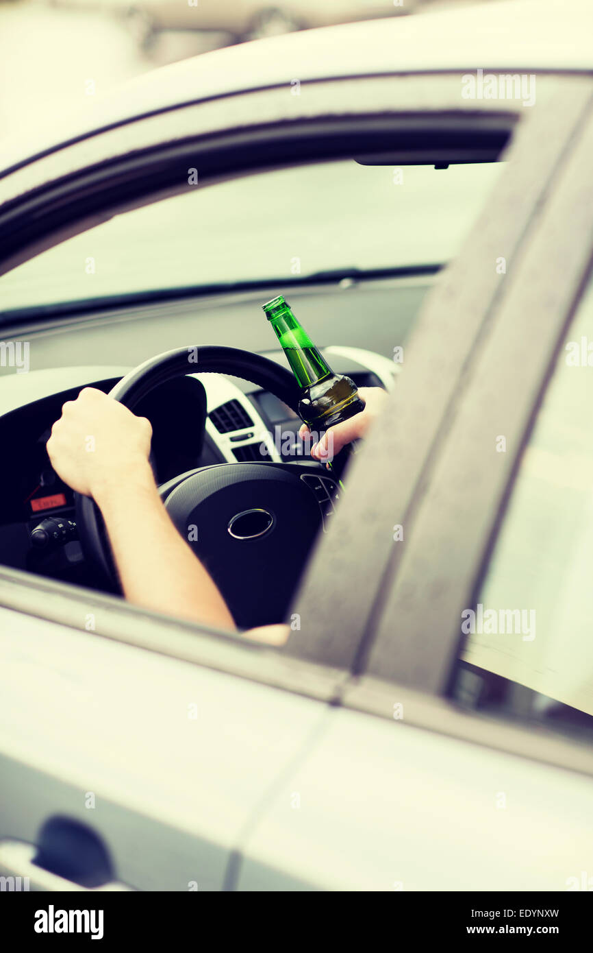 man drinking alcohol while driving the car Stock Photo - Alamy
