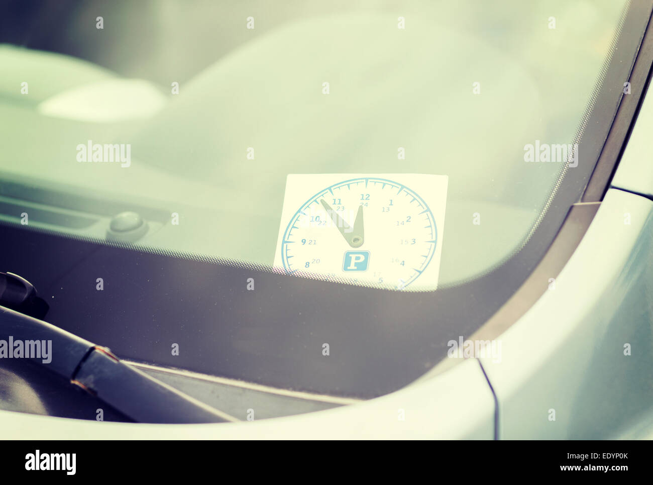 parking clock on car dashboard Stock Photo Alamy