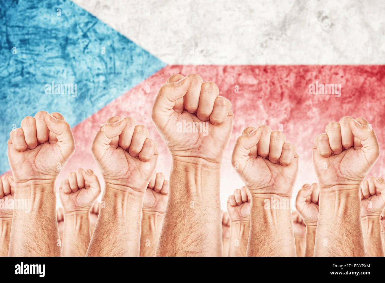 Czech Labor movement, workers union strike concept with male fists raised in the air fighting for their rights Stock Photo