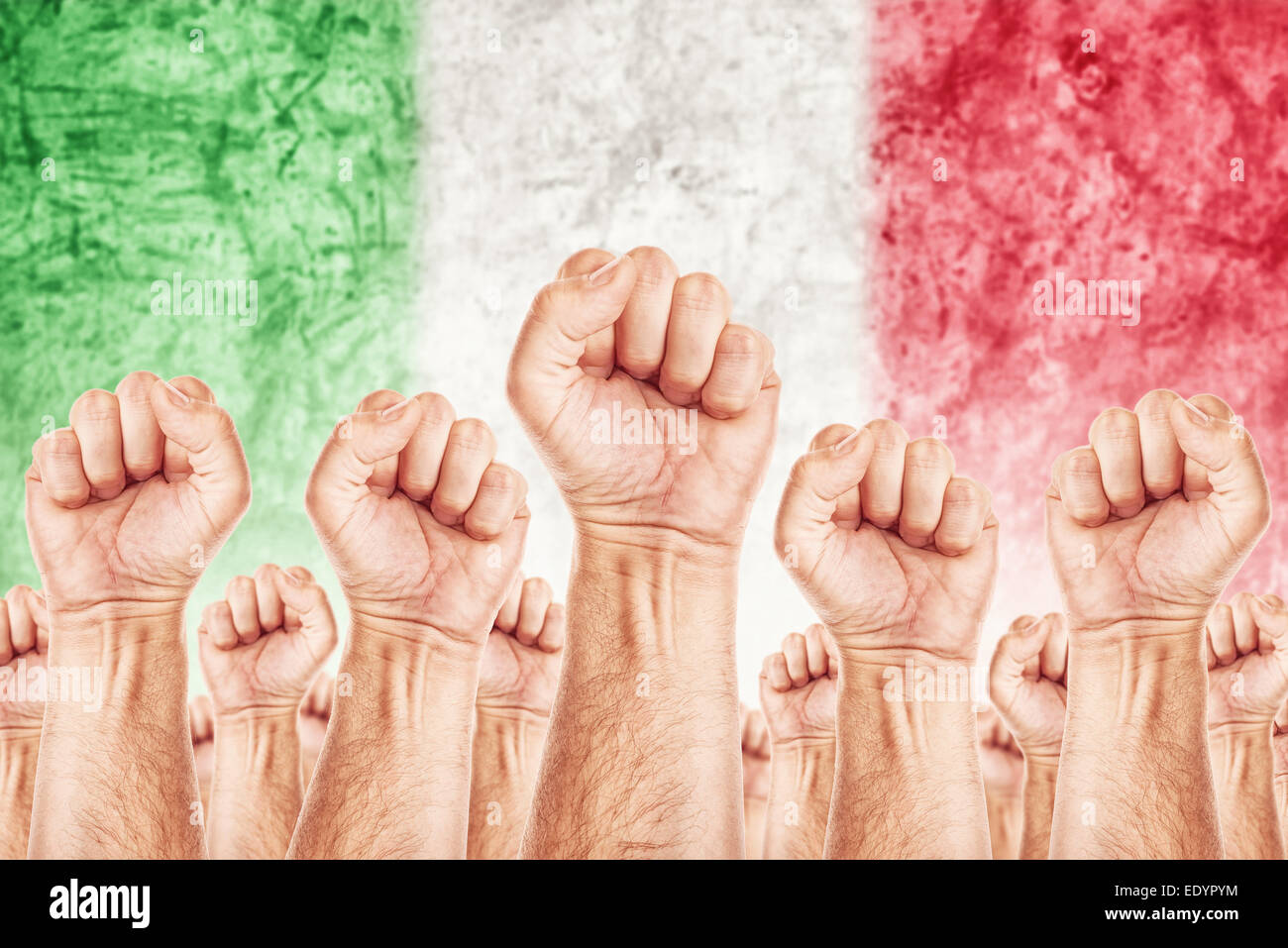 Italy Labor movement, workers union strike concept with male fists raised in the air fighting for their rights Stock Photo