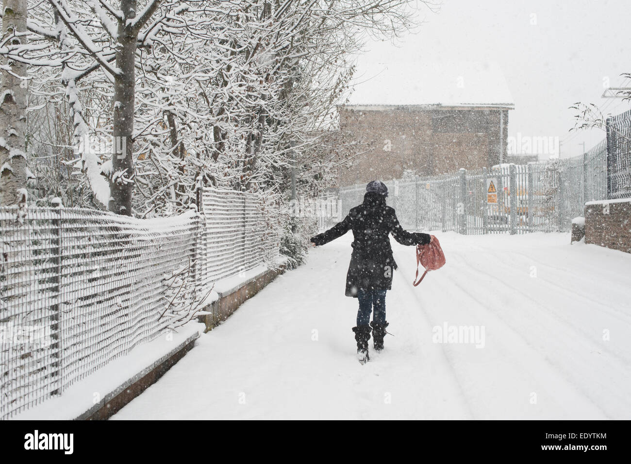 Lone person in snow hi-res stock photography and images - Alamy