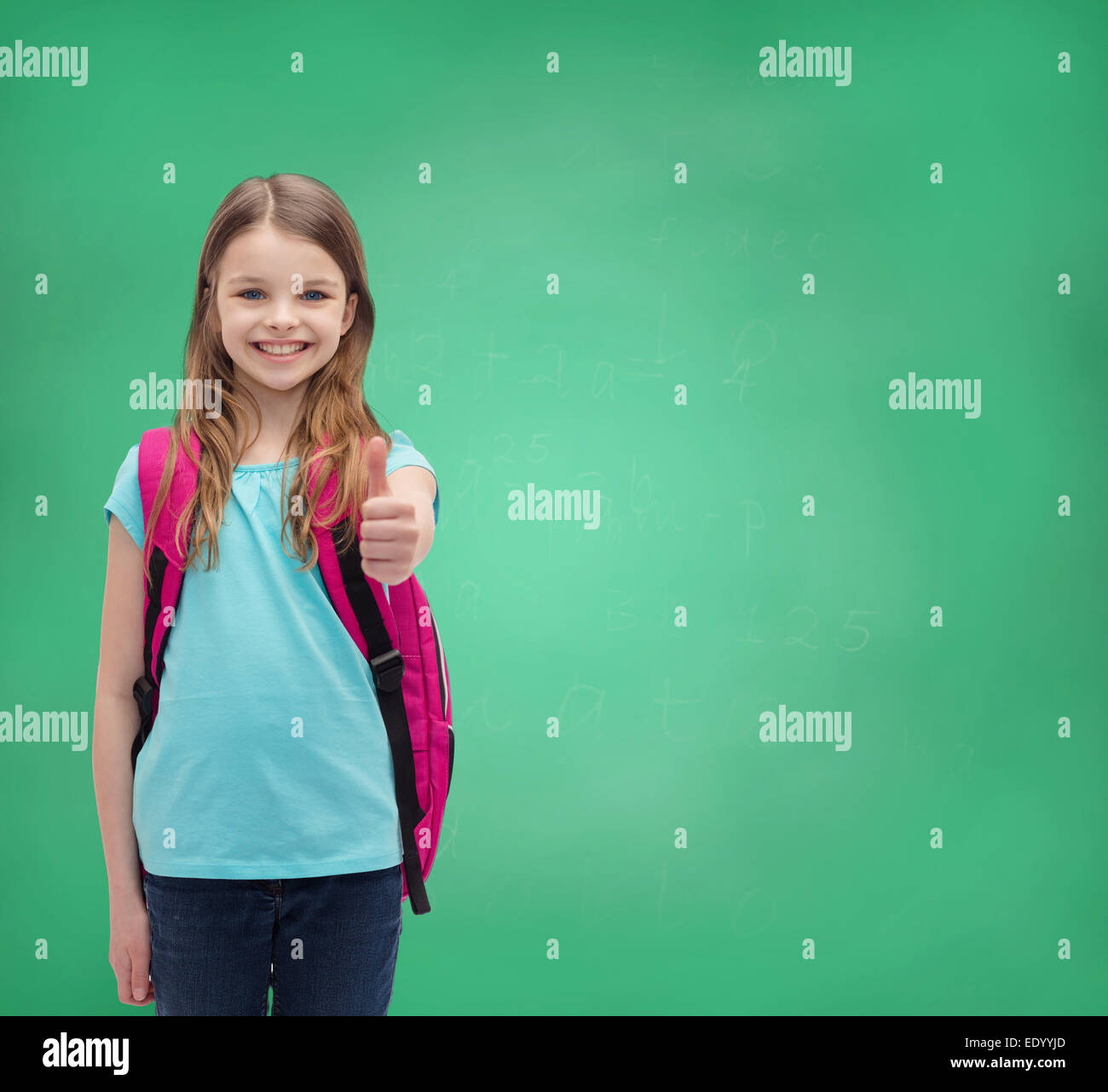 smiling girl with school bag showing thumbs up Stock Photo - Alamy