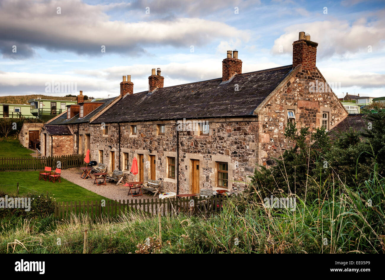 The old coast guard cottages at Budle Bay near Bamburgh Stock Photo