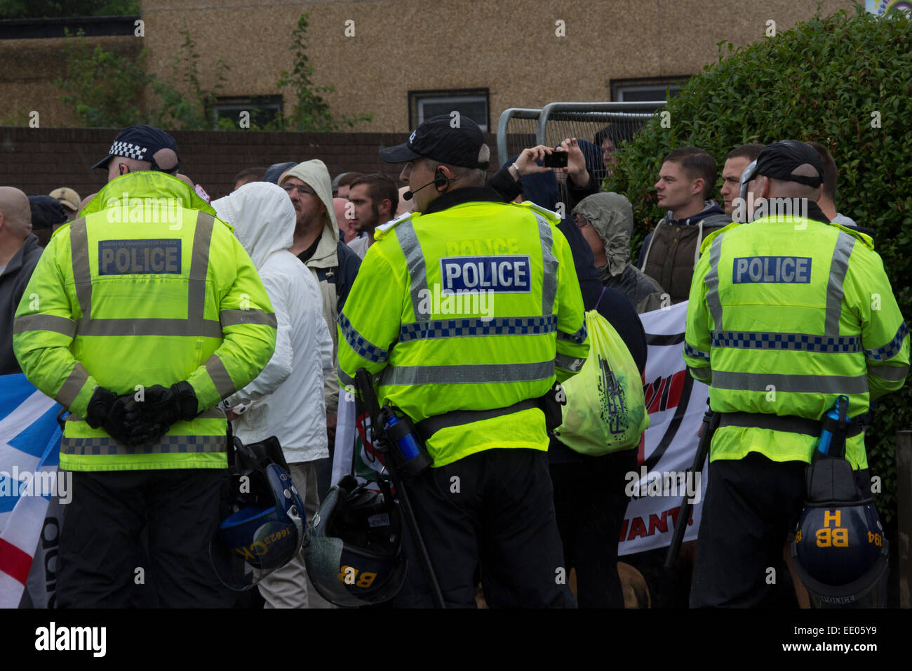 Riot police ready for a confrontation with National Front demonstrators ...