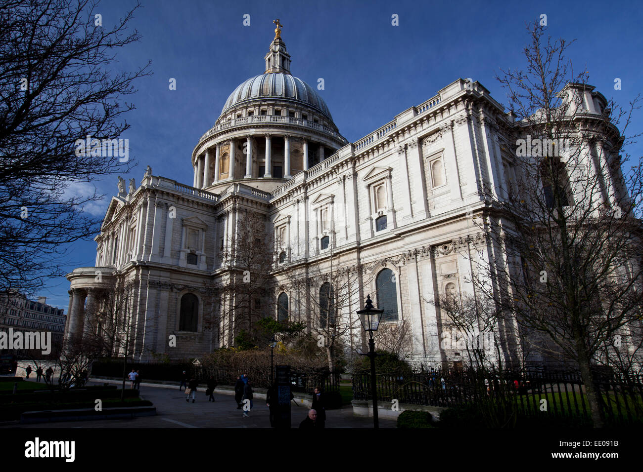 London, England, January 2015, A landscape view of pedestrians walking ourside St Paul's Cathedral during winter. Stock Photo