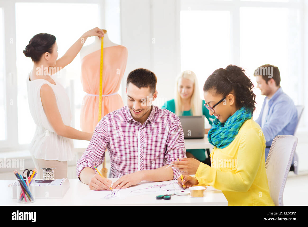 Female fashion designers drawing sketches hi-res stock photography and ...