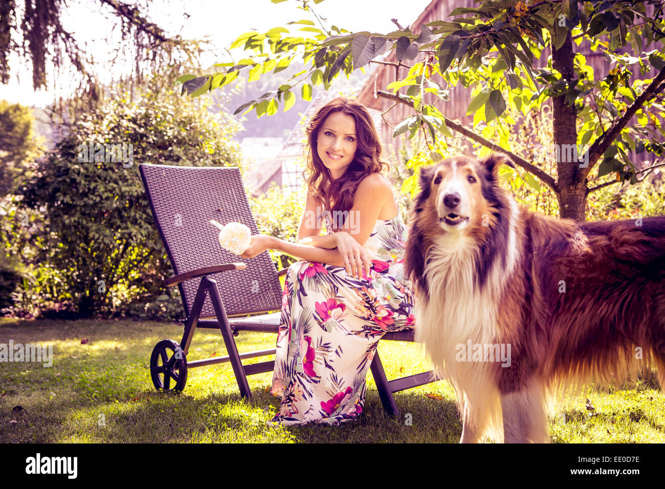 portrait of a young woman in the garden Stock Photo - Alamy
