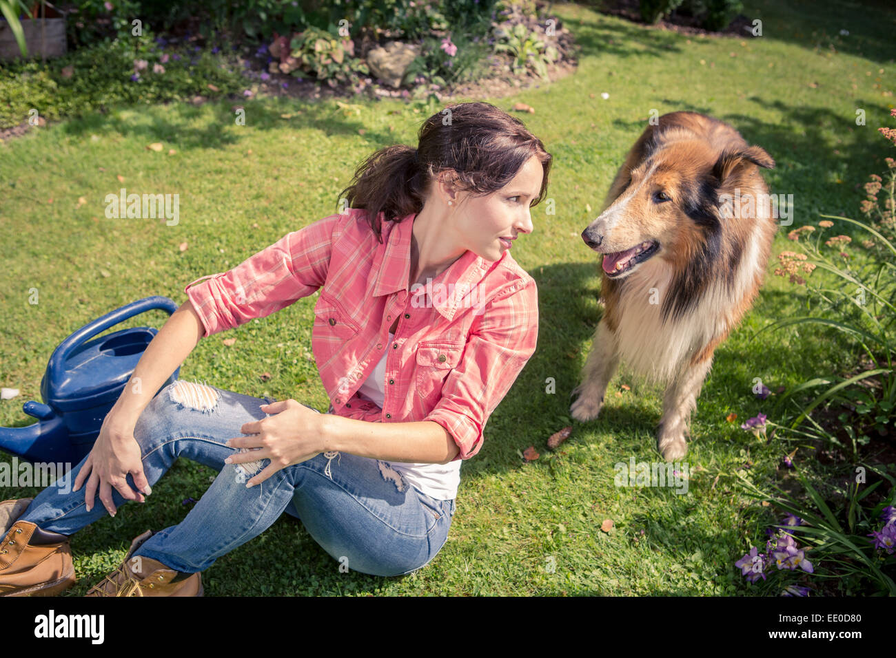 portrait of a young woman in the garden Stock Photo - Alamy