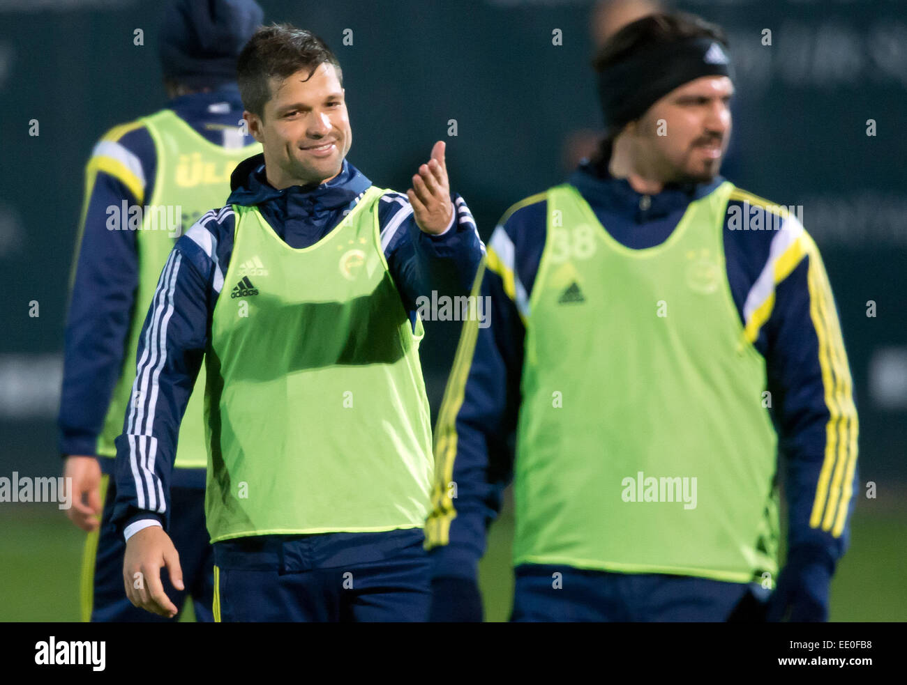 Belek, Turkey. 11th Jan, 2015. Fenerbahce Istanbul's soccer player Diego Ribas (L) gestures to Mehmet Topuz during a training session in Belek, Turkey, 11 January 2015. Fenerbahce stays in Belek to prepare for the second half of the Süper Lig season. Photo: Soeren Stache/dpa/Alamy Live News Stock Photo