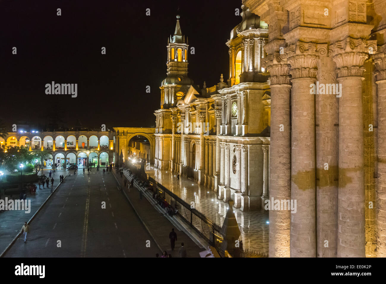 View of the floodlit front facade of the iconic Basilica Cathedral of Arequipa floodlit at night, Plaza de Armas, downtown Arequipa, Peru Stock Photo