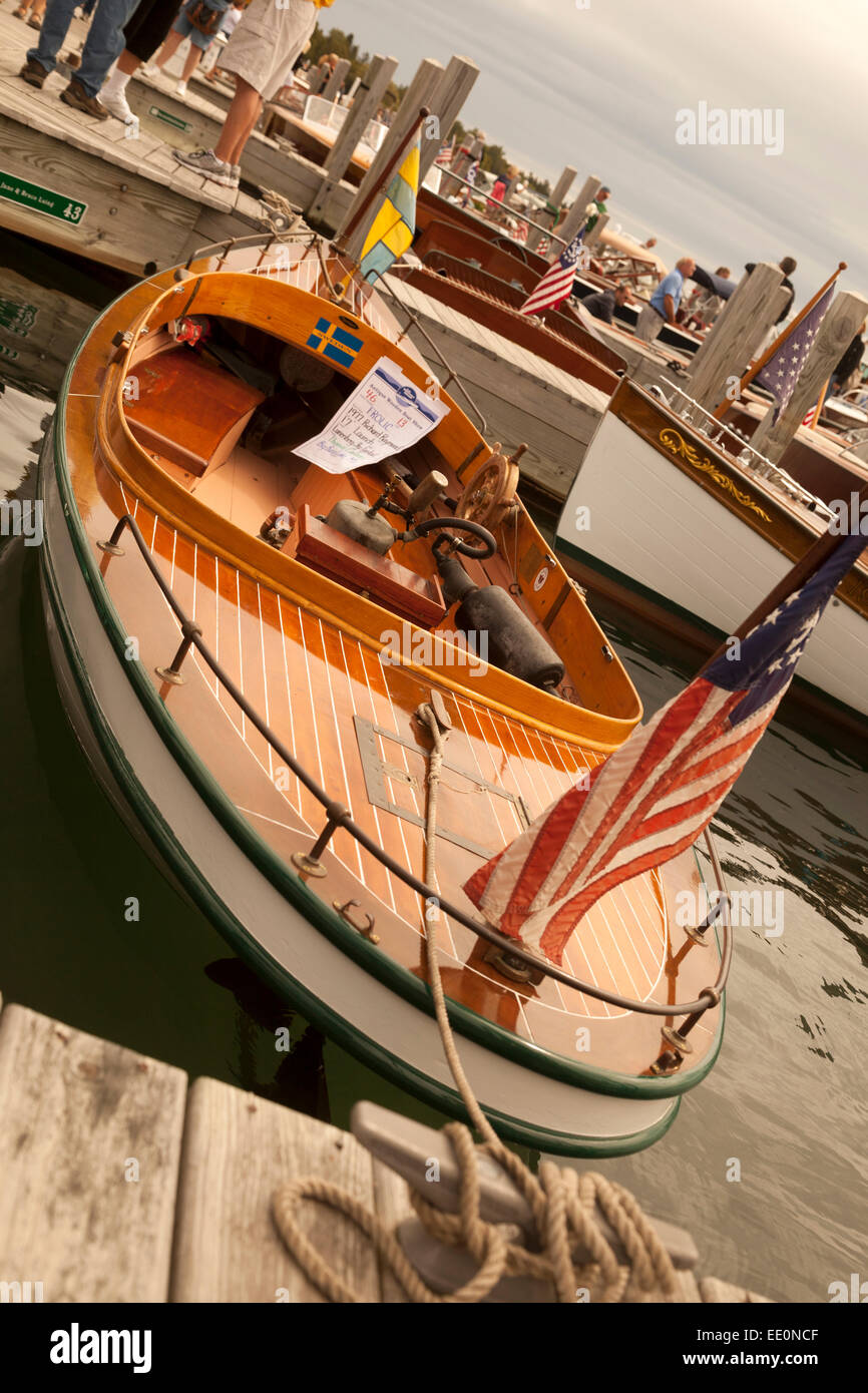 old vintage wood boat with American flag at boat show Stock Photo