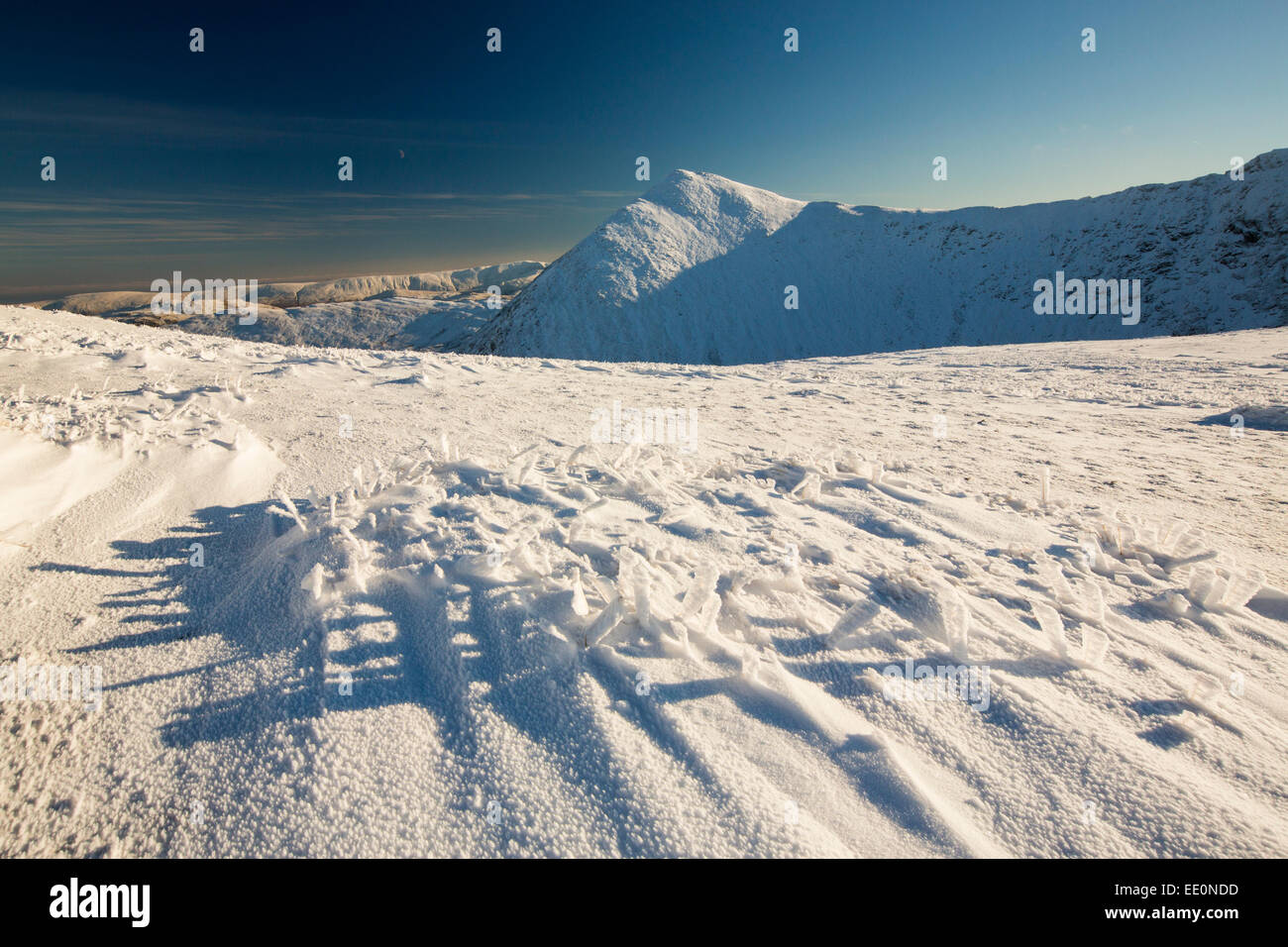 Catstycam on the side of Helvellyn in the Lake District in snow. Stock Photo