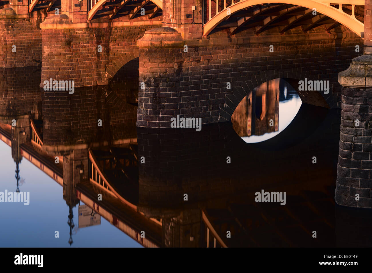 The City of Newport's town bridge and castle reflected in the river Usk. Stock Photo