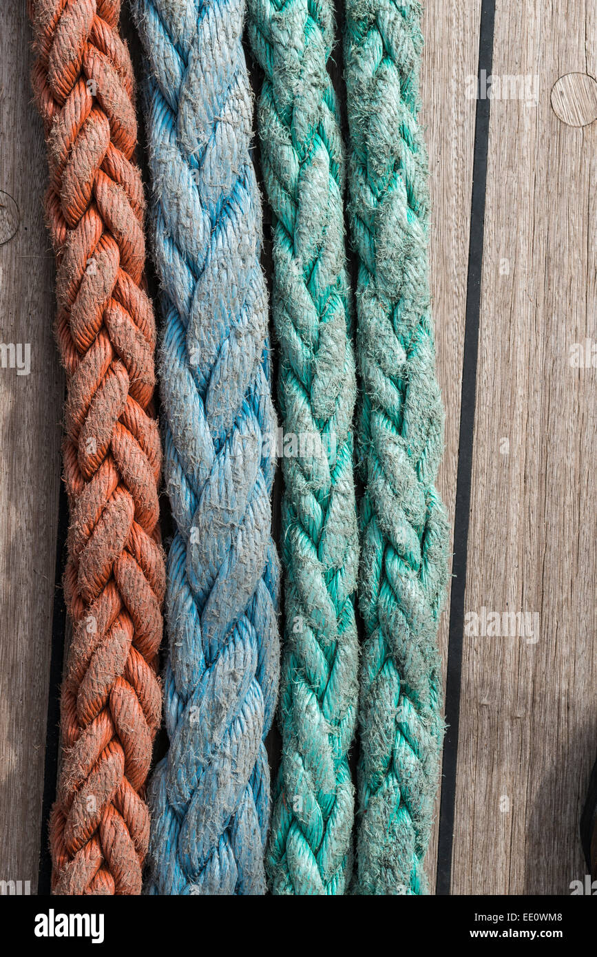 Colored rope on the deck of a Tall Ships sailing vessel. Stock Photo