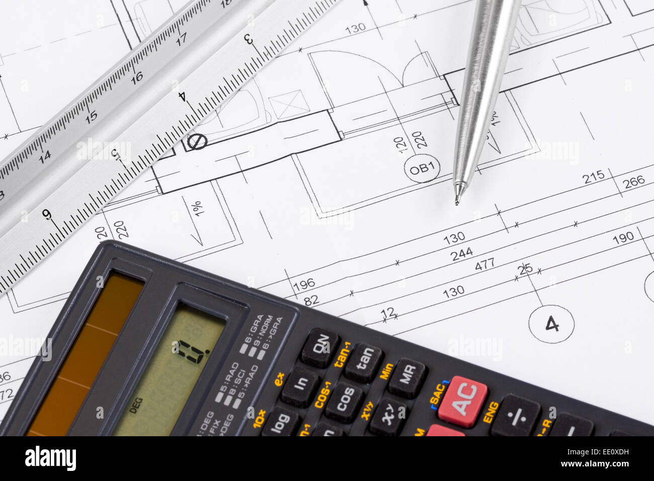 Calculator on architectural blueprint, design background Stock Photo ...