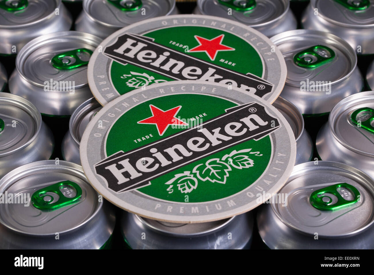 Czech Republic, Brno - January 5,2015: Pattern from much of drinking cans of beer and Heinekem beermats.Heineken Lager Beer,it w Stock Photo