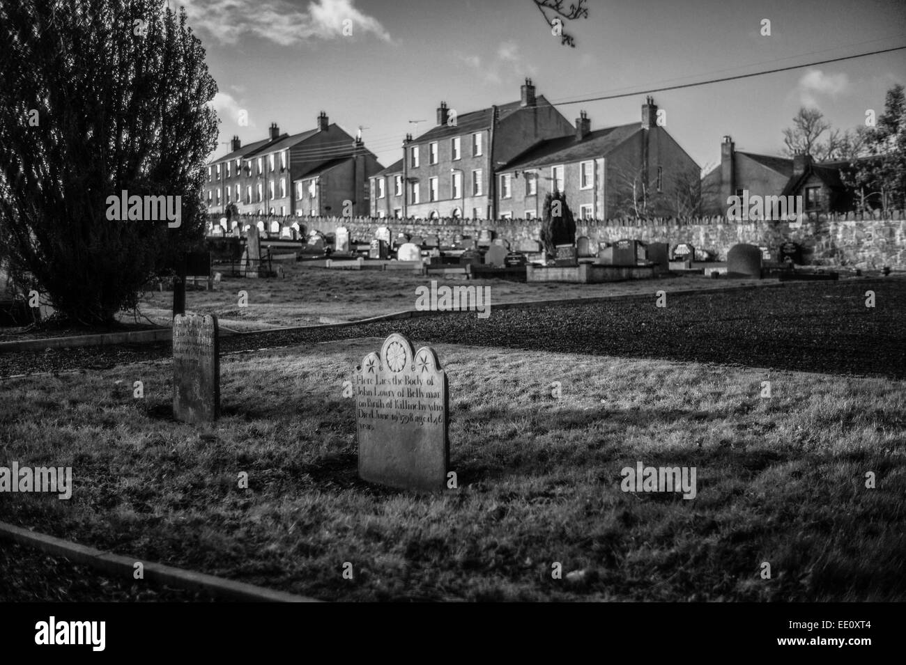 Graveyard at rear of First Saintfield Presbyterian Church in Co Down, Northern Ireland.  The two headstones date from 1798. Stock Photo