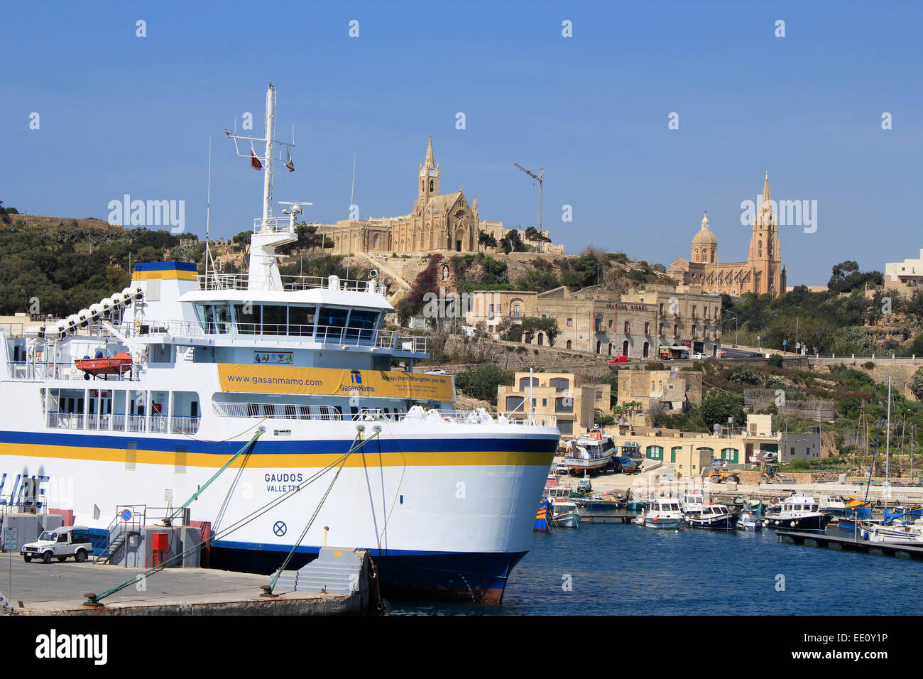 Ferry at dock, at the Port of Mgarr, Gozo on a bright sunny day. Stock Photo