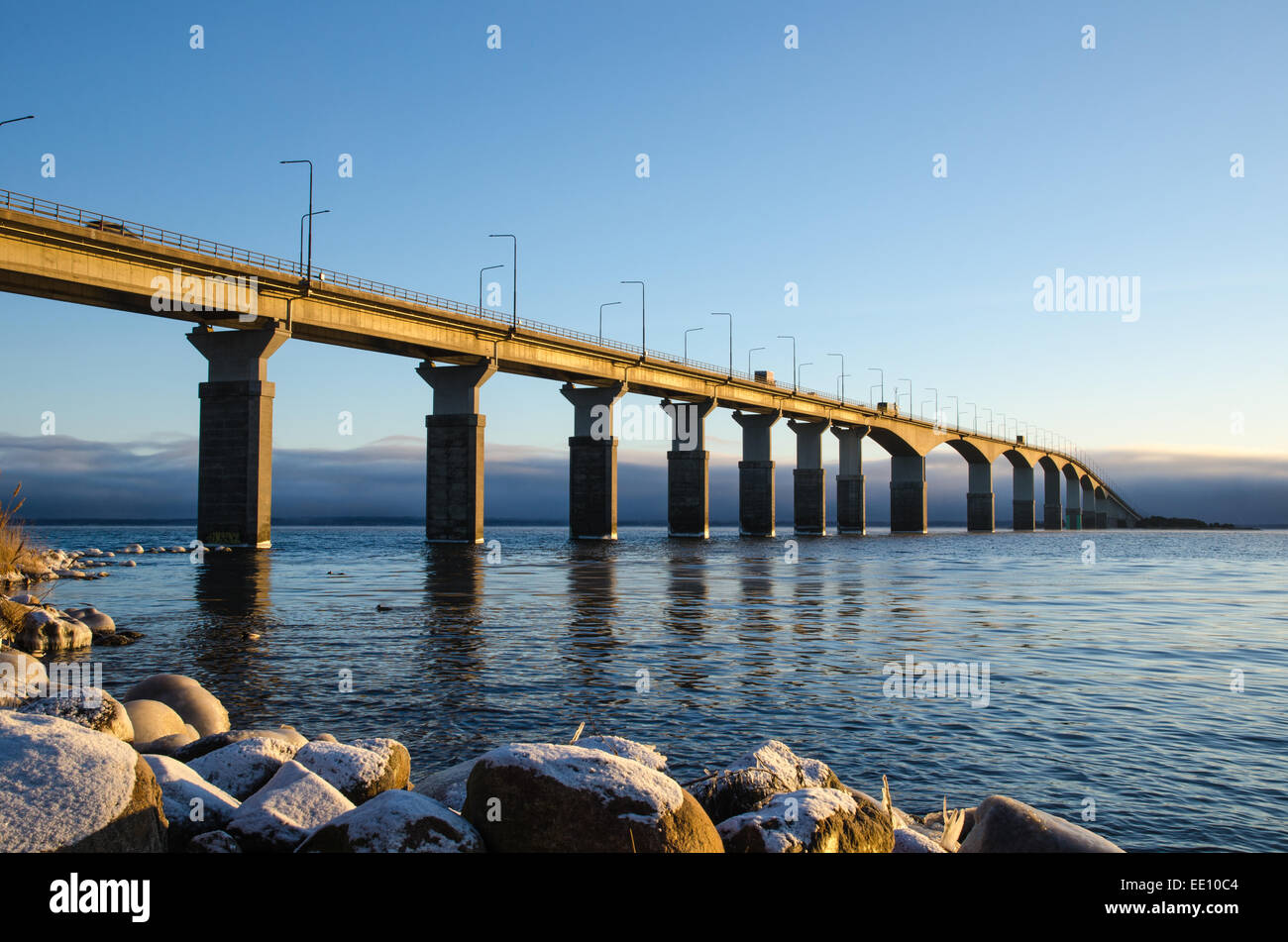 The Oland bridge in Sweden in the first winter morning sun. The bridge is one of the longest bridges in Europe and is connecting Stock Photo