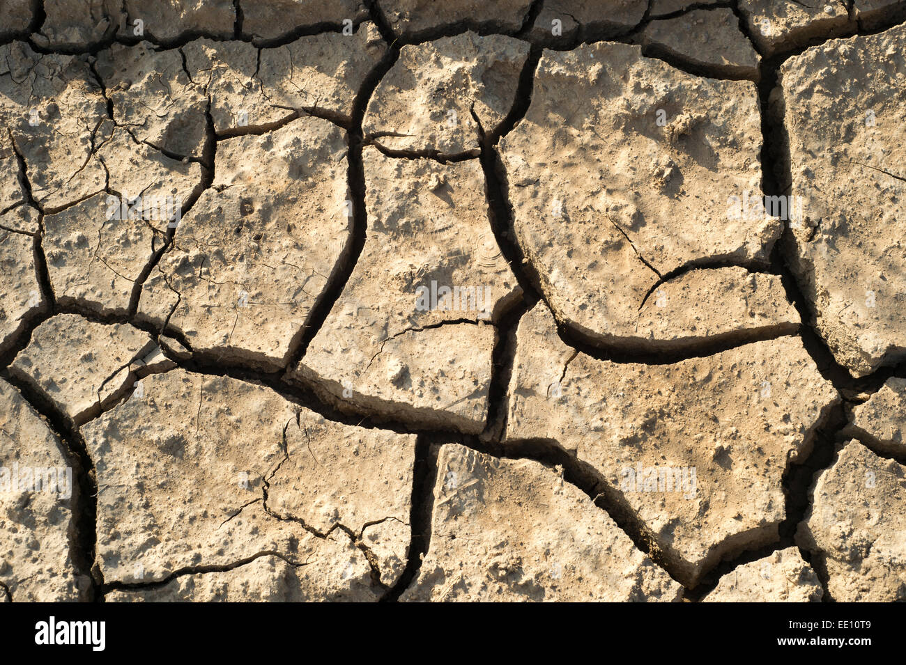 cracked dry earth due to drought and climate Stock Photo