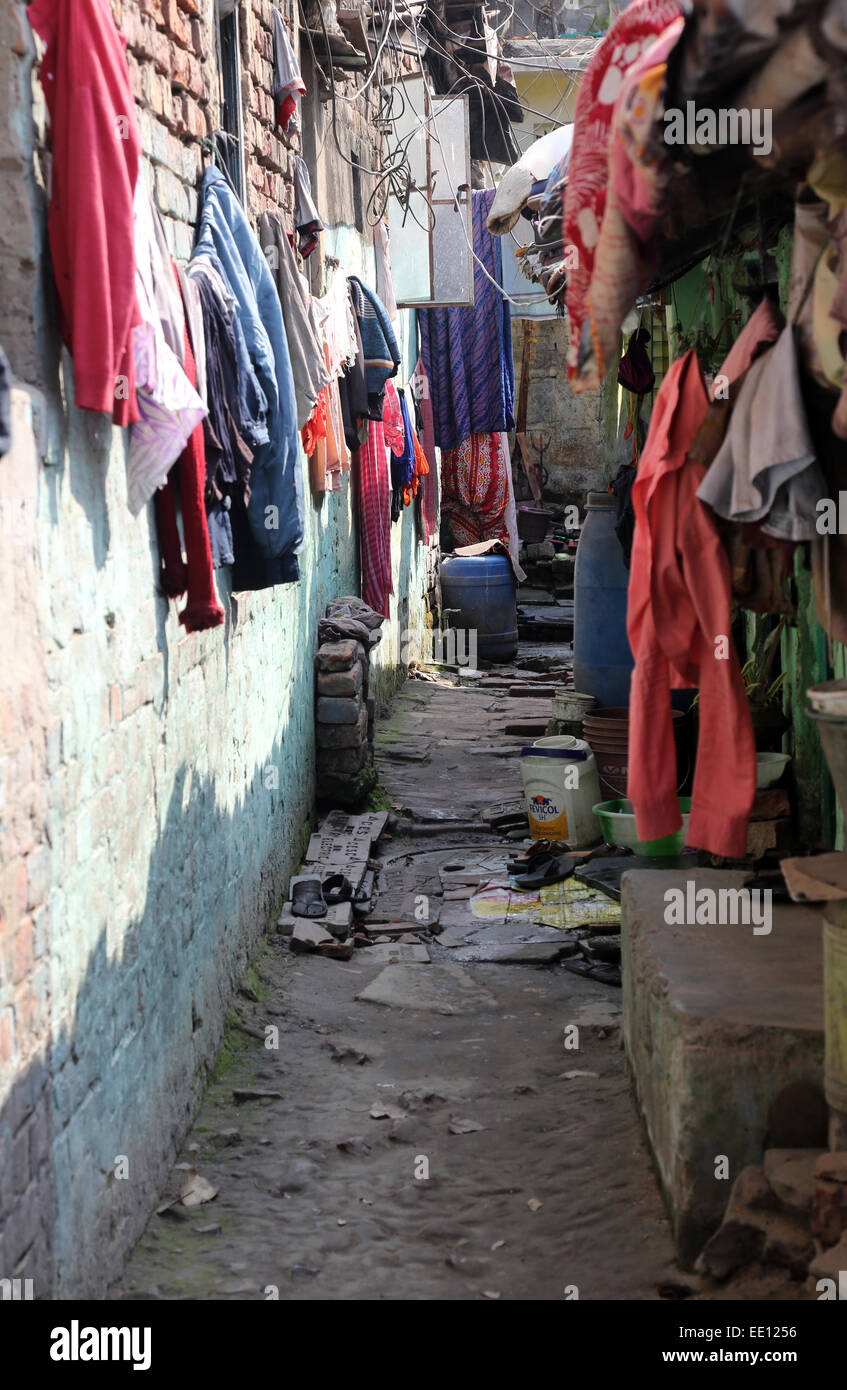 Slum residents drying stuff outside, Kolkata, India Stock Photo