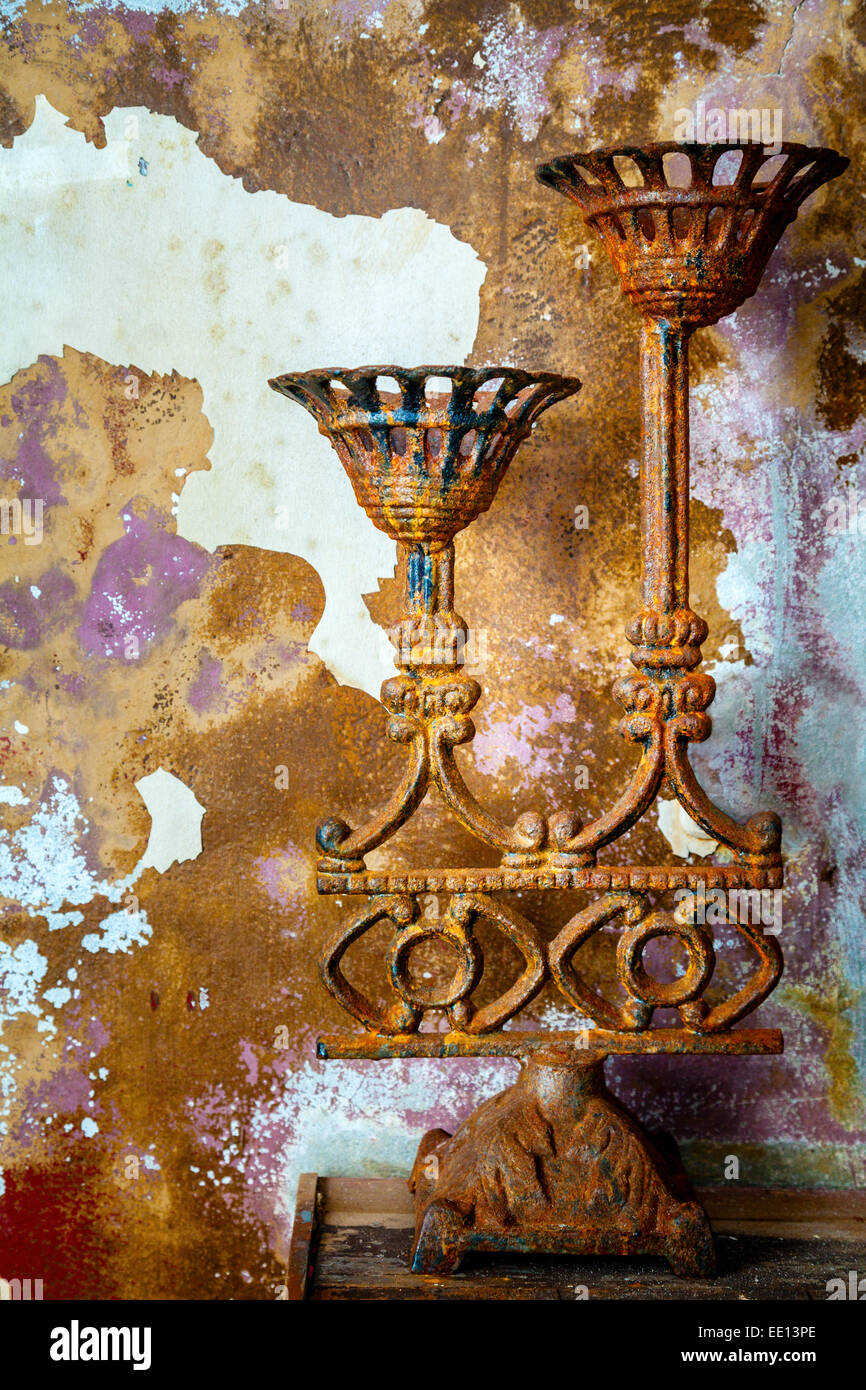 Old candelabra at an abandoned shop in Iceland Stock Photo