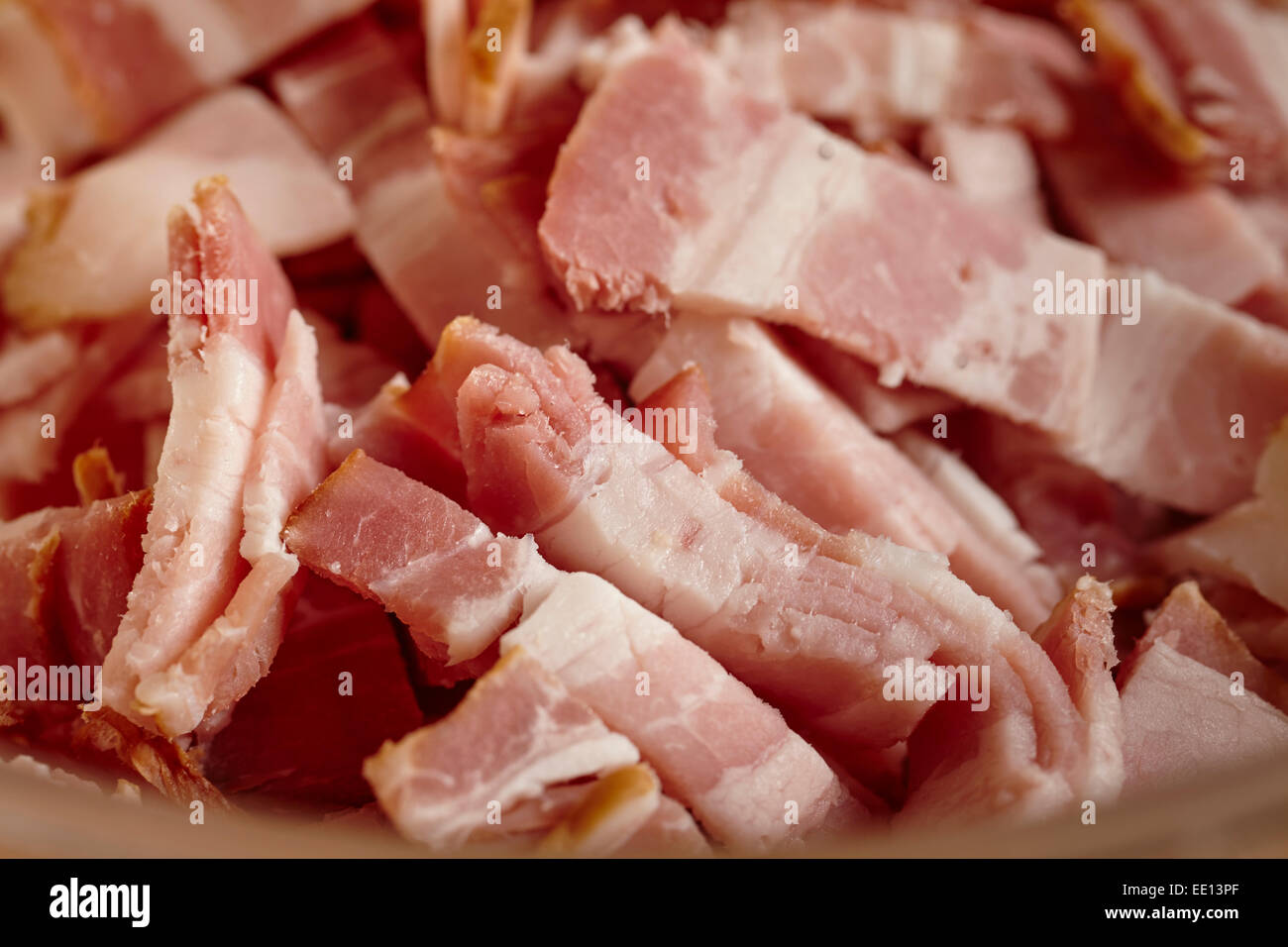 Pieces of uncooked raw bacon Stock Photo Alamy