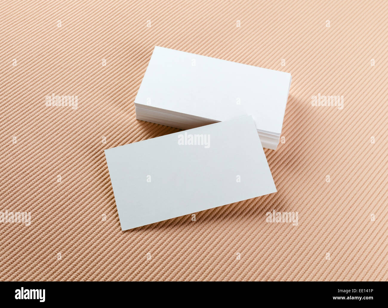 Stack Of Blank Business Cards On A Colored Background Template For