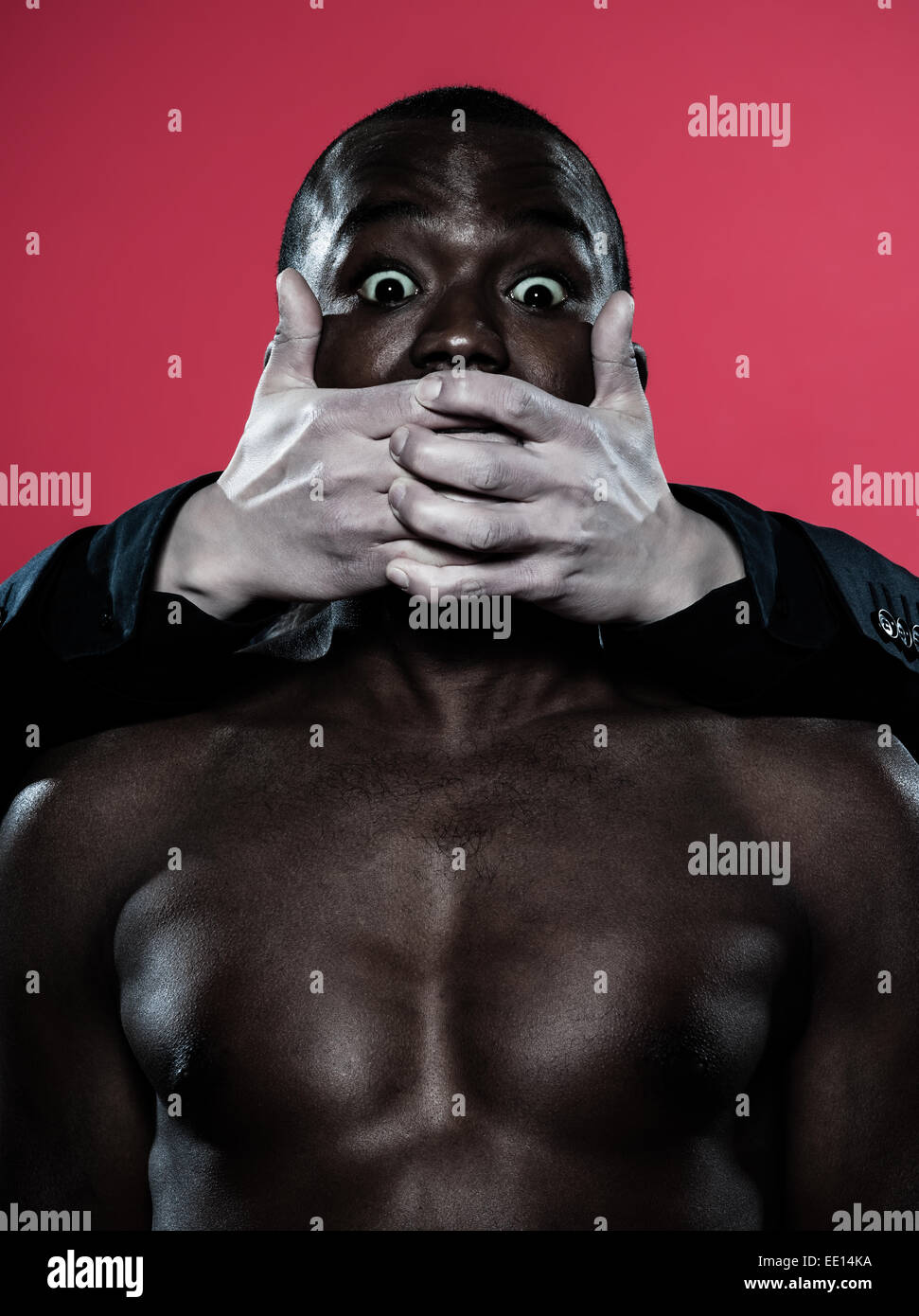 one african man hand on his mouth Freedom of speech concept Stock Photo